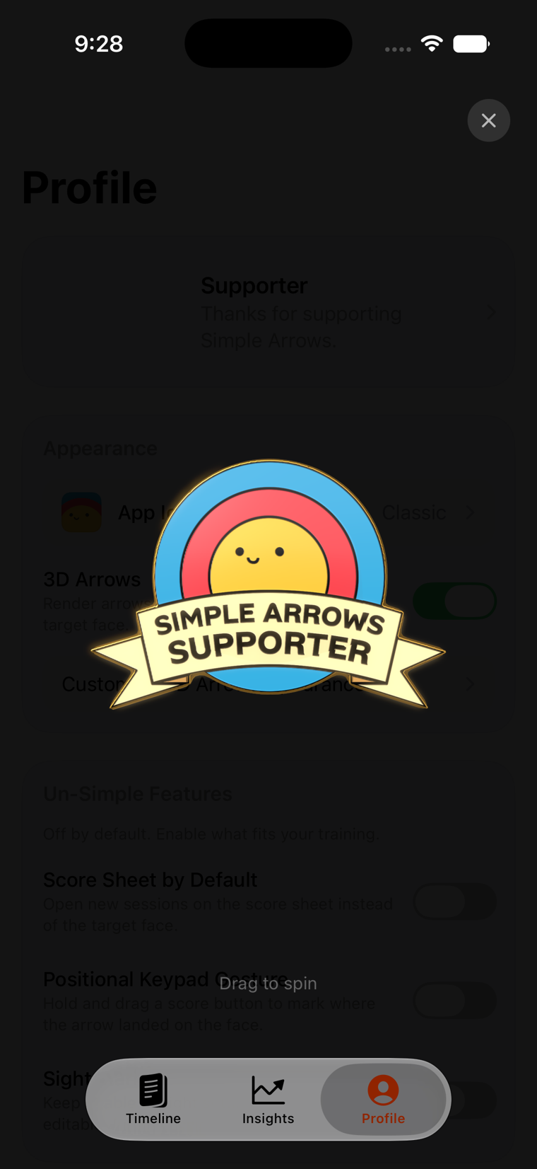 An enamel Simple Arrows Supporter pin on the profile screen, turning as it is dragged.